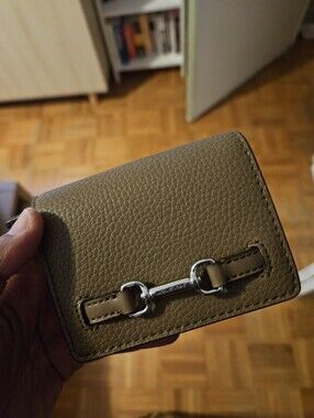 Michal Kors Pebbled Leather Wallet with Silver Bit Hardware